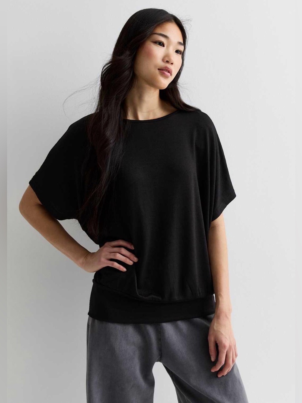 The Reset R label Black Short Sleeve Batwing Top 100% wool